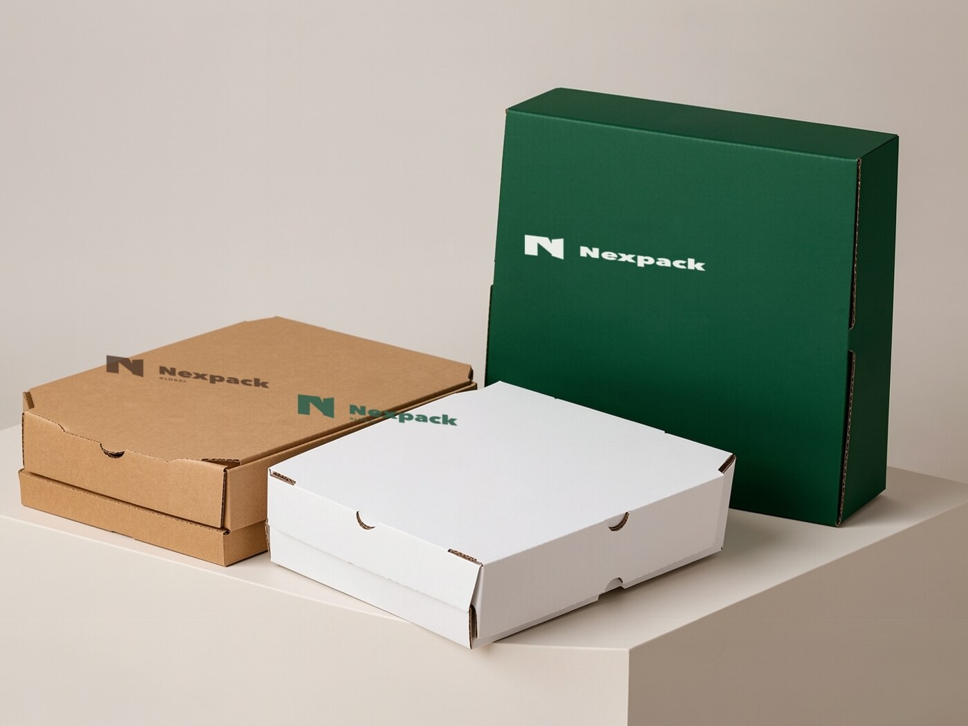 Kraft, white, and green corrugated pizza box range with Nexpack Global branding